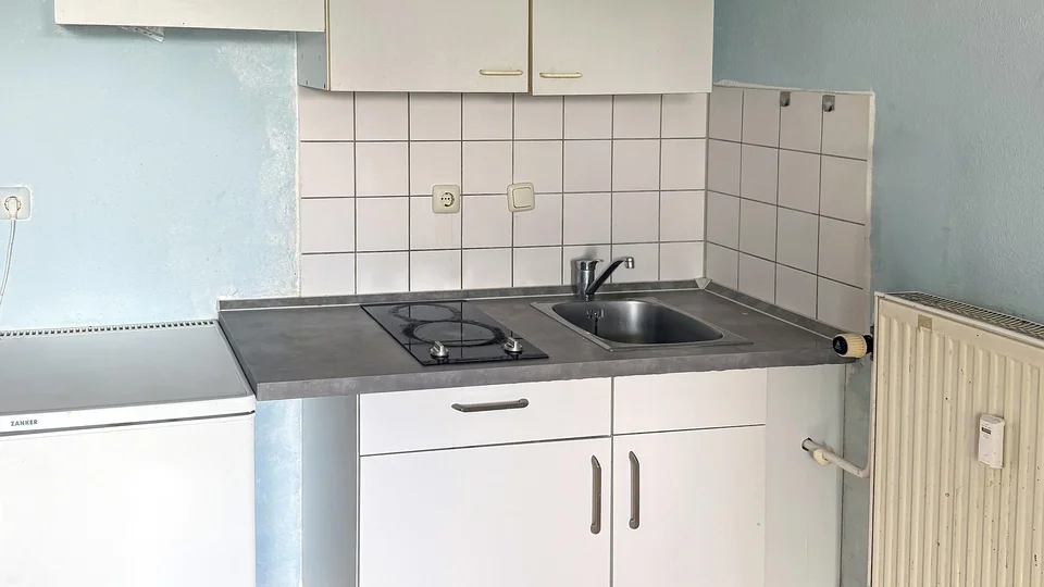 Kapitalanlage mit Perspektive – Vermietetes 1-Zimmer-Apartment mit Balkon in zentraler Lage